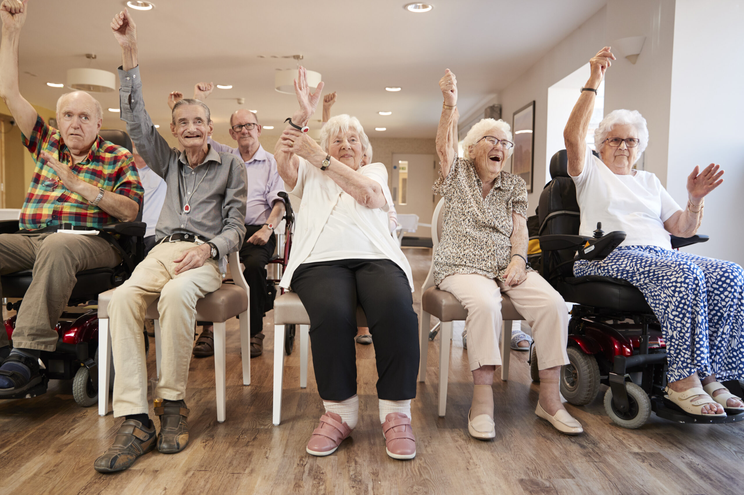 Care Home Fall Prevention Tech - Seniors enjoying time in care home